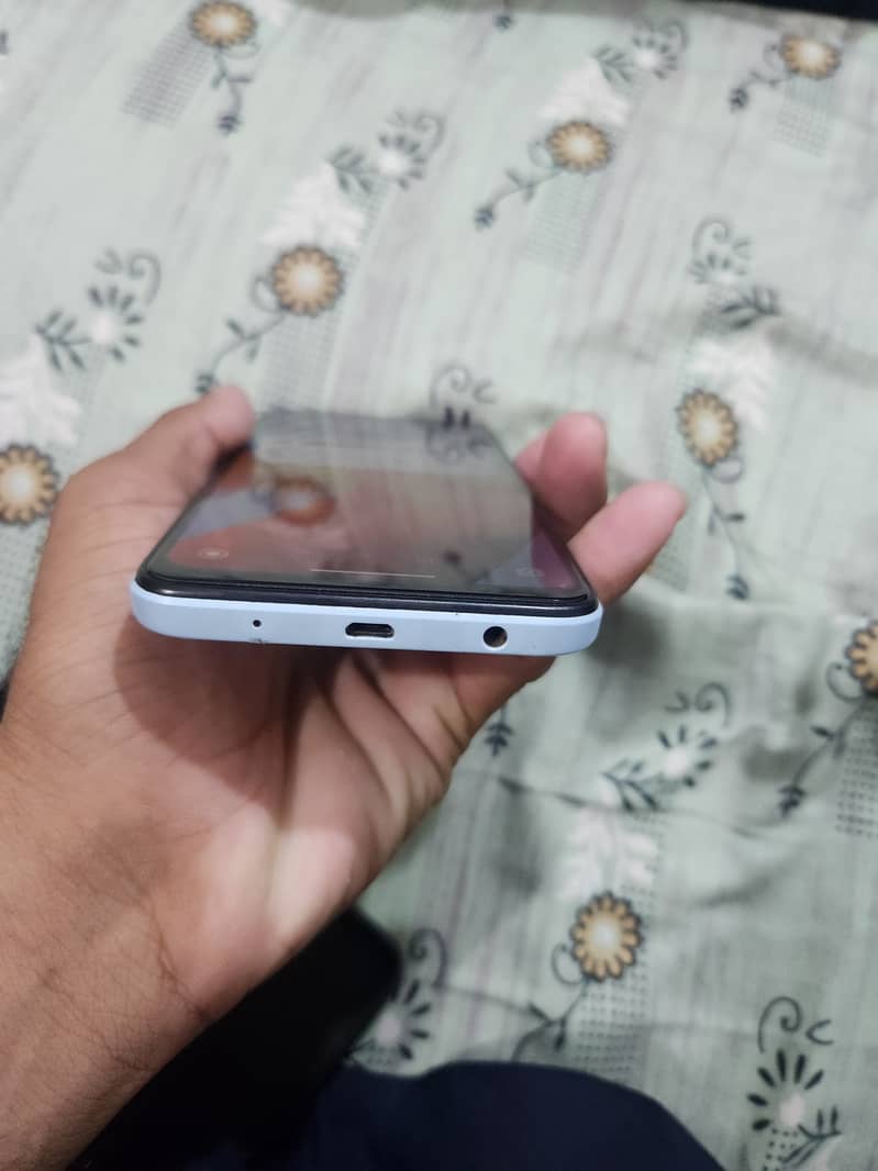 Redmi A2+ 1