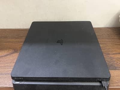 Playstation 4 Slim with one God of War controller
