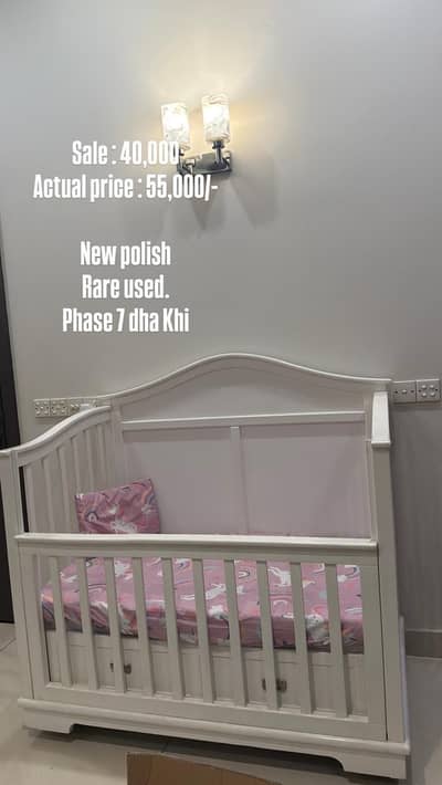 White polish deco baby cot