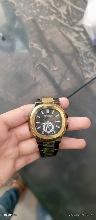 Curren watch with master lock