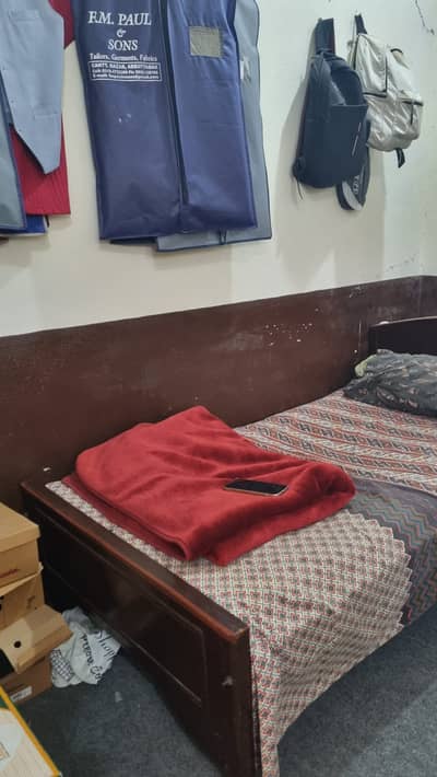 Single wooden bed