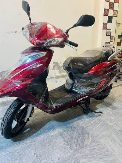 united 2023 self start petrol auto. matic100cc scoty