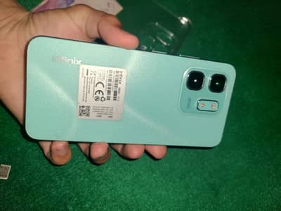 Infinix hot 50i . . . 6+6. . 128 GB ma h
