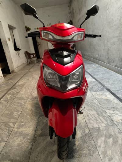 electric Scooty red colour Metro  all Punjab number Laga