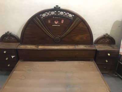 bed and side tables of wood without matress