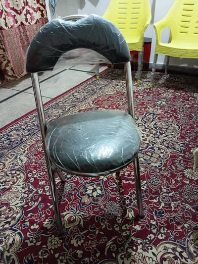 folding chair. . . . steelless steel