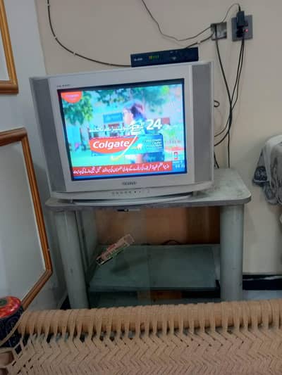 Samsung tv 21 inches  and tv trolly