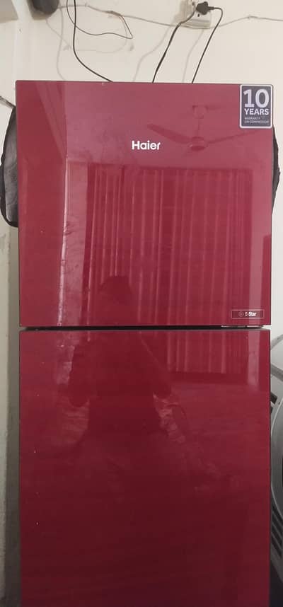 Haier red glass۔