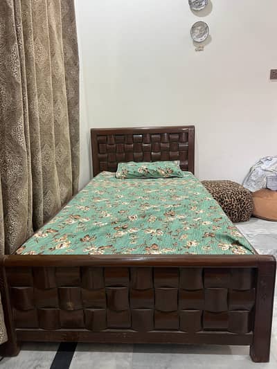 wooden single bed