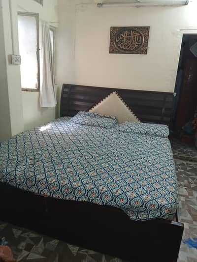 king size bed with mattress and dressing table