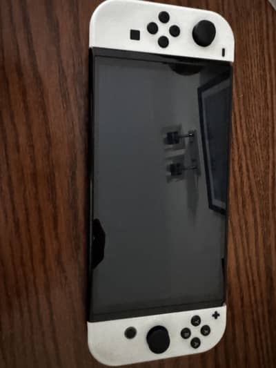 NINTENDO SWITCH OLED WHITE JOYCONS USED 9/10 condition
