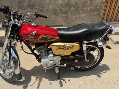 24 model 125 selfstart red gold