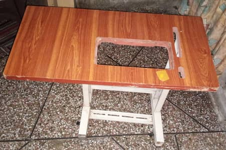 Sewing machine table
