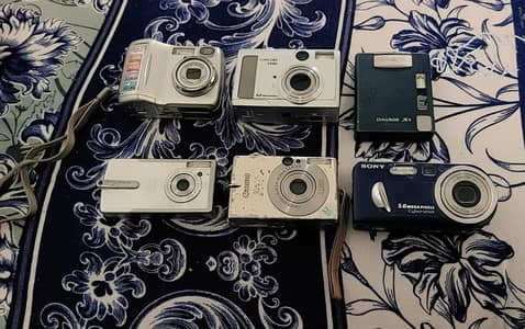 Two canon , sony and other camera