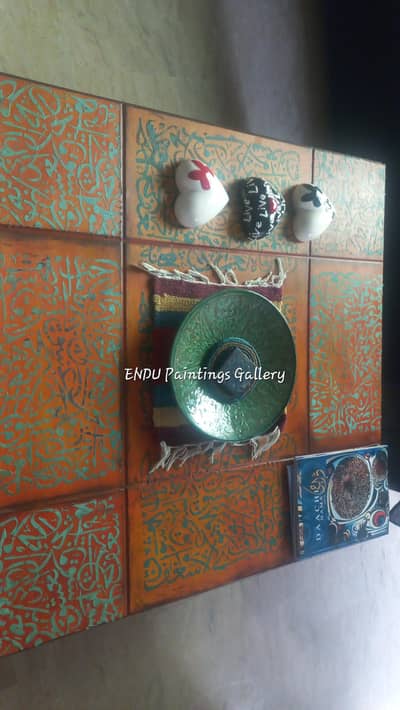 calligraphy on wooden table