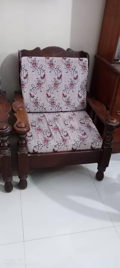 wooden sofas with their cushions