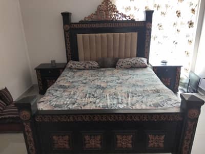 King Size bed set and table.