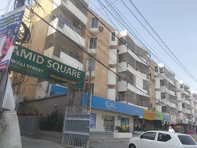 Gulshan e iqbal block 3.3 bedrooms  2 washrooms Road facing  1300 sq ft Boundary wall project  Lease flat Demand 1.70 *Code(16431)*