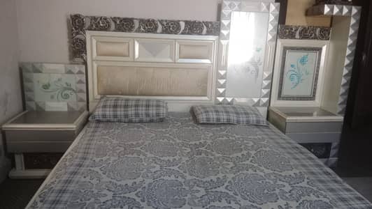 king size bed with dressing  and cupboard