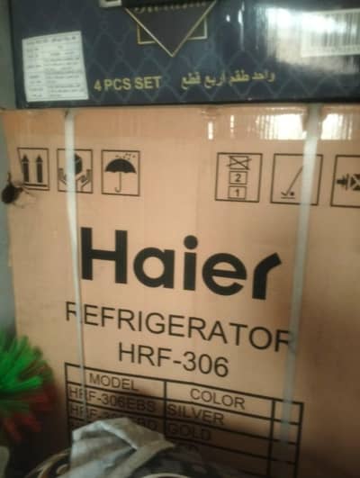 Haier ki frig ha new pack ha calour black ha Gujaranwala city housing