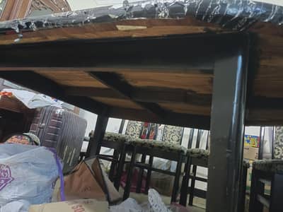 wooden table with 6 chairs