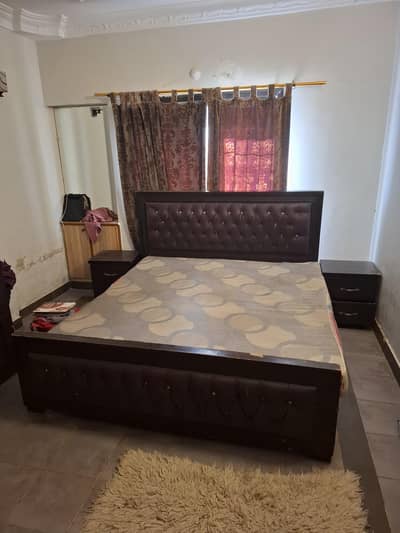 king size bed with side tables without mattress