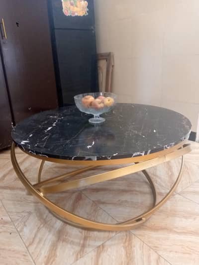 Golden metal frame modern table .