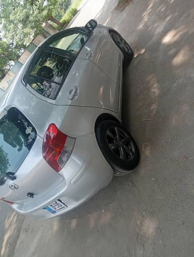 Toyota vitz 2009 model 2013 registered Islamabad number fit condition