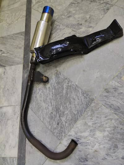 Honda 125 silencer or bracket. . .