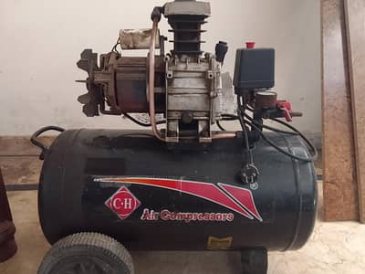 C. H Air Compressor
