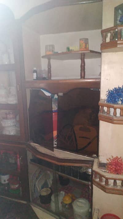 tv trali crockery  and other things etc cupboard