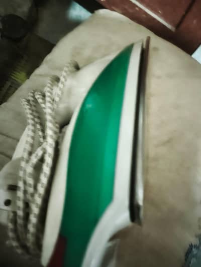 light weight iron and sewing machine in working condition
