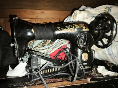 singer orgnl machine witih. motor