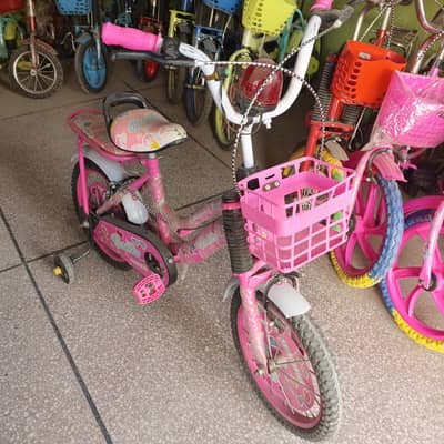 new barbie doll cycle pink color urgent sale