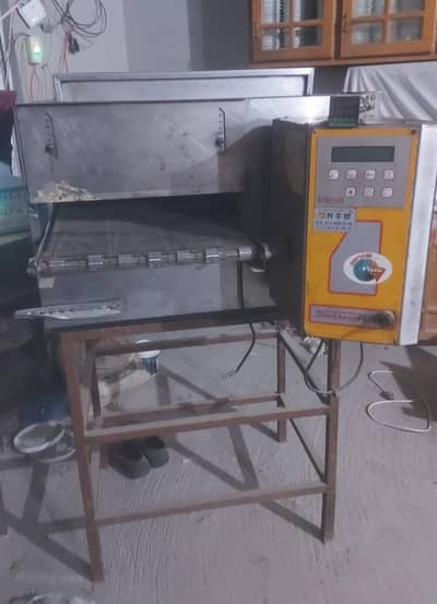 Pizza Conveyor gas oven for 14 inch pizza and a Dough Roller