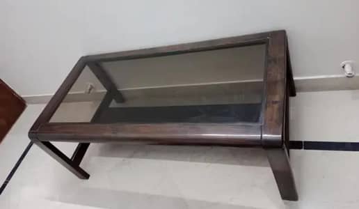 wooden table in very good condition with glass top