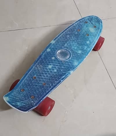 Second hand blue skateboard 8-12