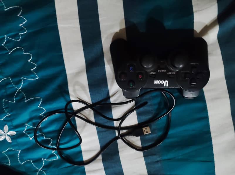 Logitech keyboard, wireless mouse, headphones, controller 2