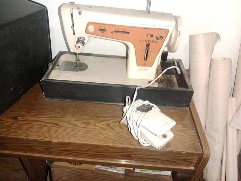 singer machine 3