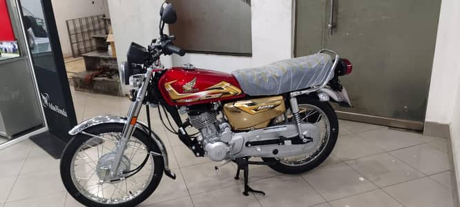 Honda 125 red gold self start zerometer open leter