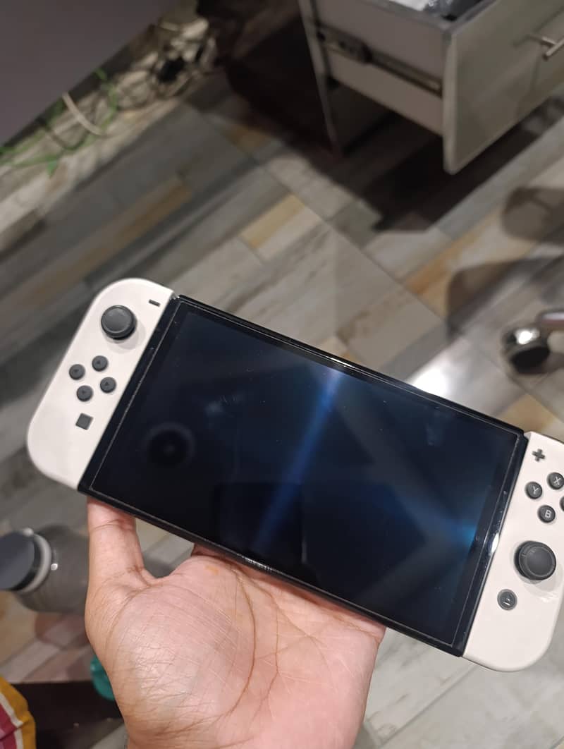 Nintendo switch oled 10/10 1