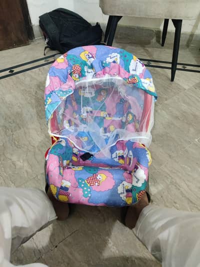 Baby carrier, carry cot, bouncer
