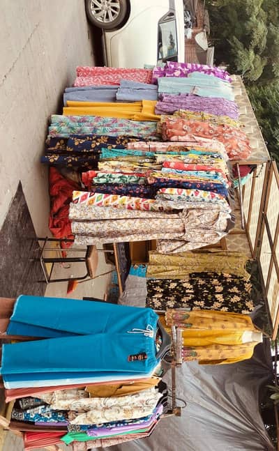 Clothing shop on loader for sale