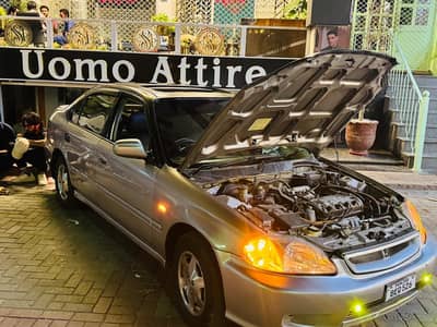 automatic Honda civic sunroof 10/10 condition AC bio matric on spot