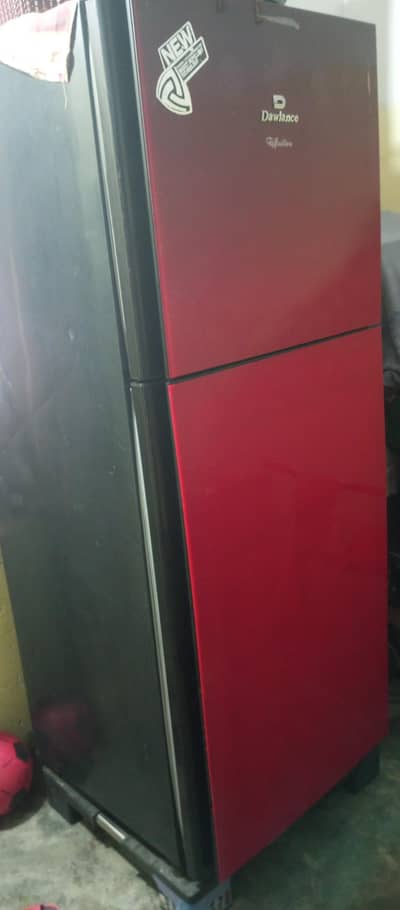 dawlance fridge red and black colour. raks glass, very fresh conditions