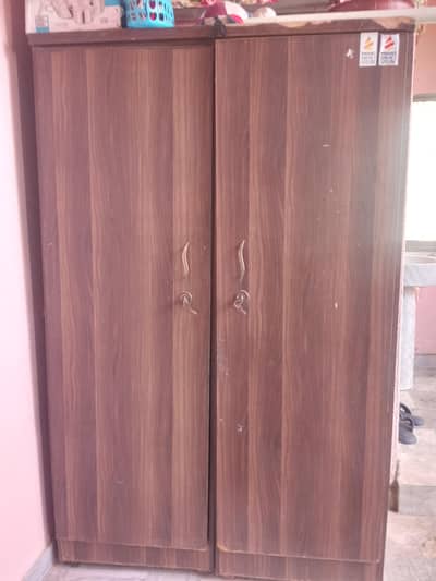 2 door wooden cup board almari used condition 10/7