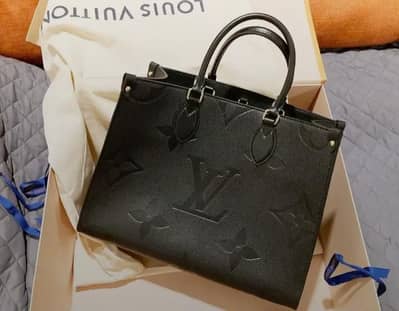 lv on the go authentica coded bag excellent condition