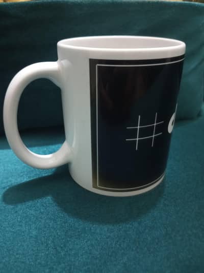 white and black ceramic coffee mug-Good condition