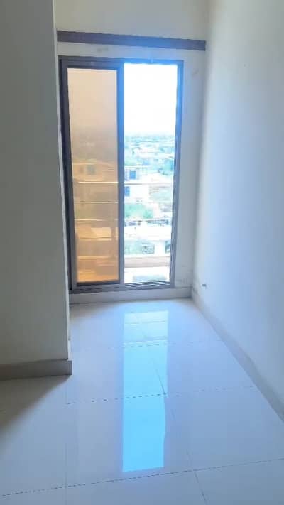 2 Bed Apartment Double Road Facing Builder Transfer Available For Sale in Block B-1 Markaz MPCHS Multi Gardens B-17 Islamabad.