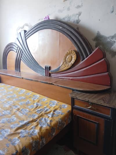 double bed with dressing and side tables